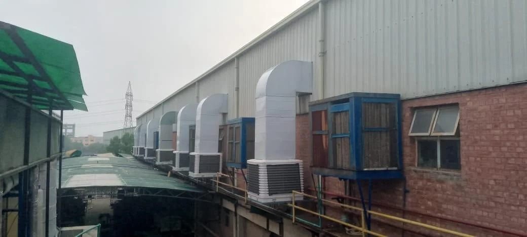 Evaporative cooling ducting in an industrial facility